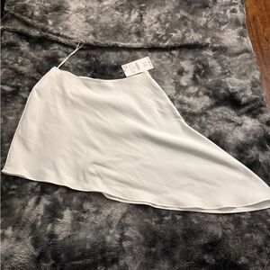 One Houlder asymmetrical white top